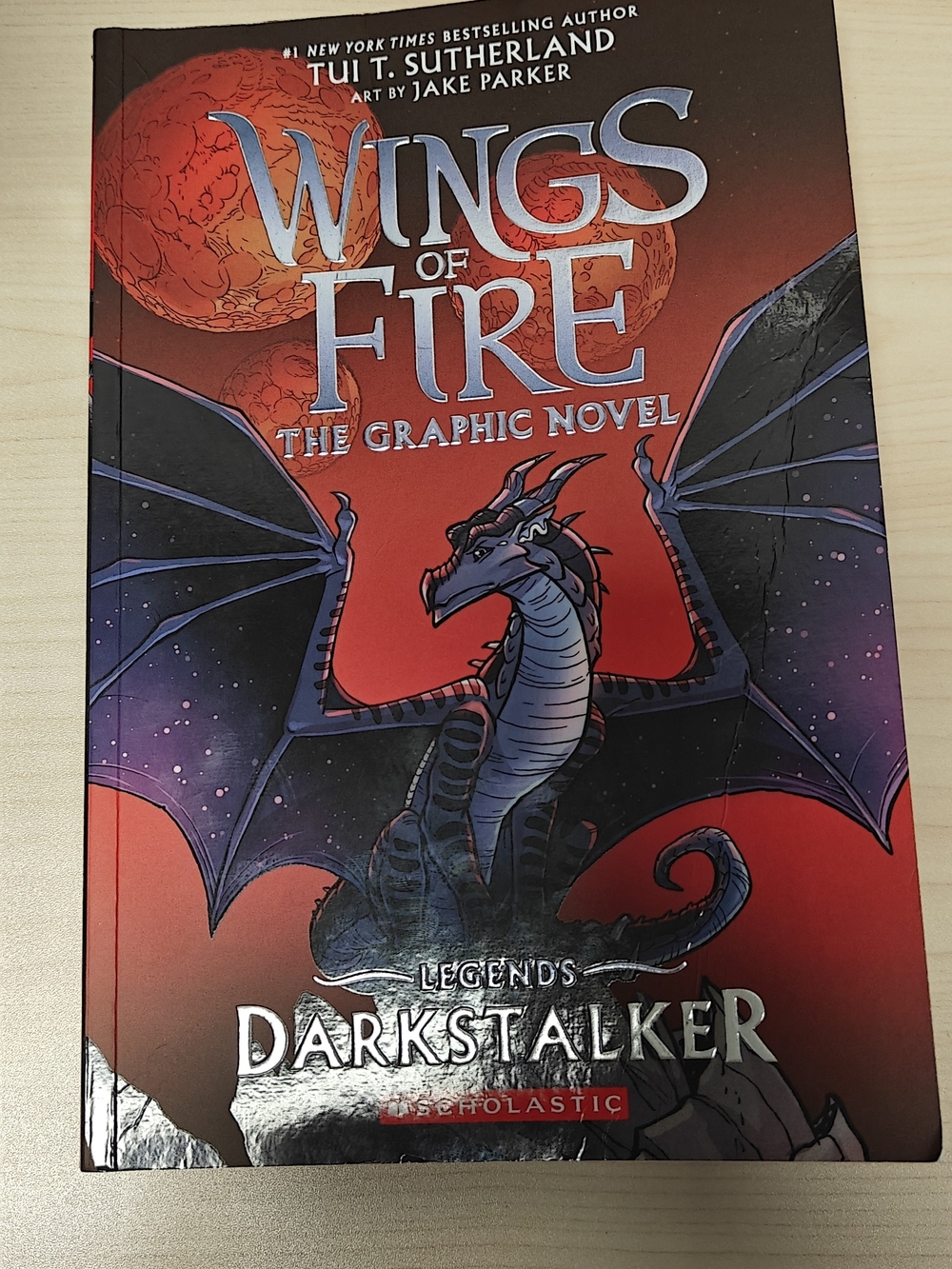 Scholastic Wings of Fire: Darkstalker – Blue & Red Title Cover